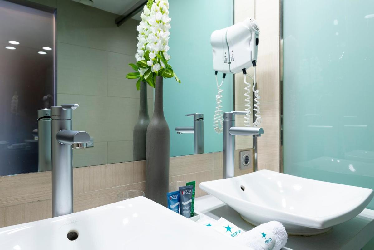 Un baño de Hotel & Spa Real Ciudad De Zaragoza