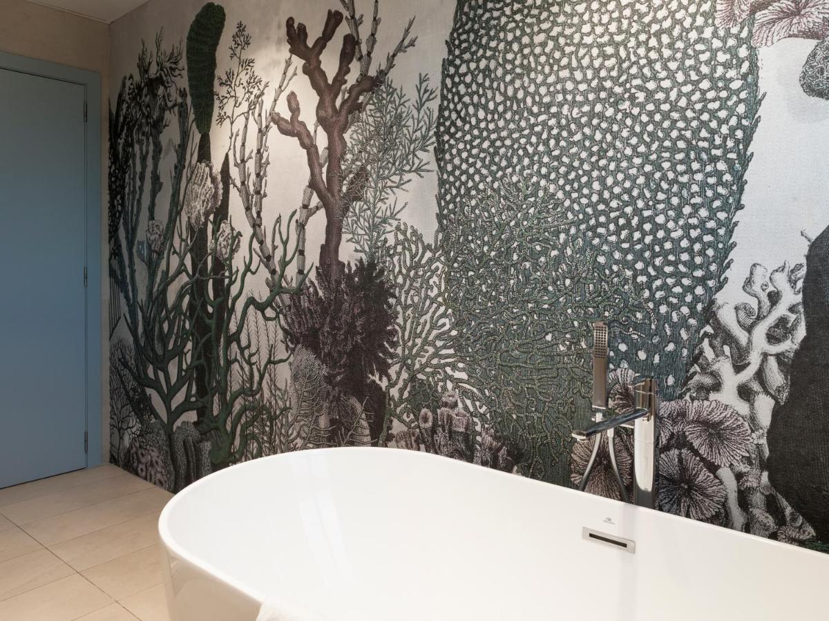 Un baño de Hotel Neptuno Playa & Spa