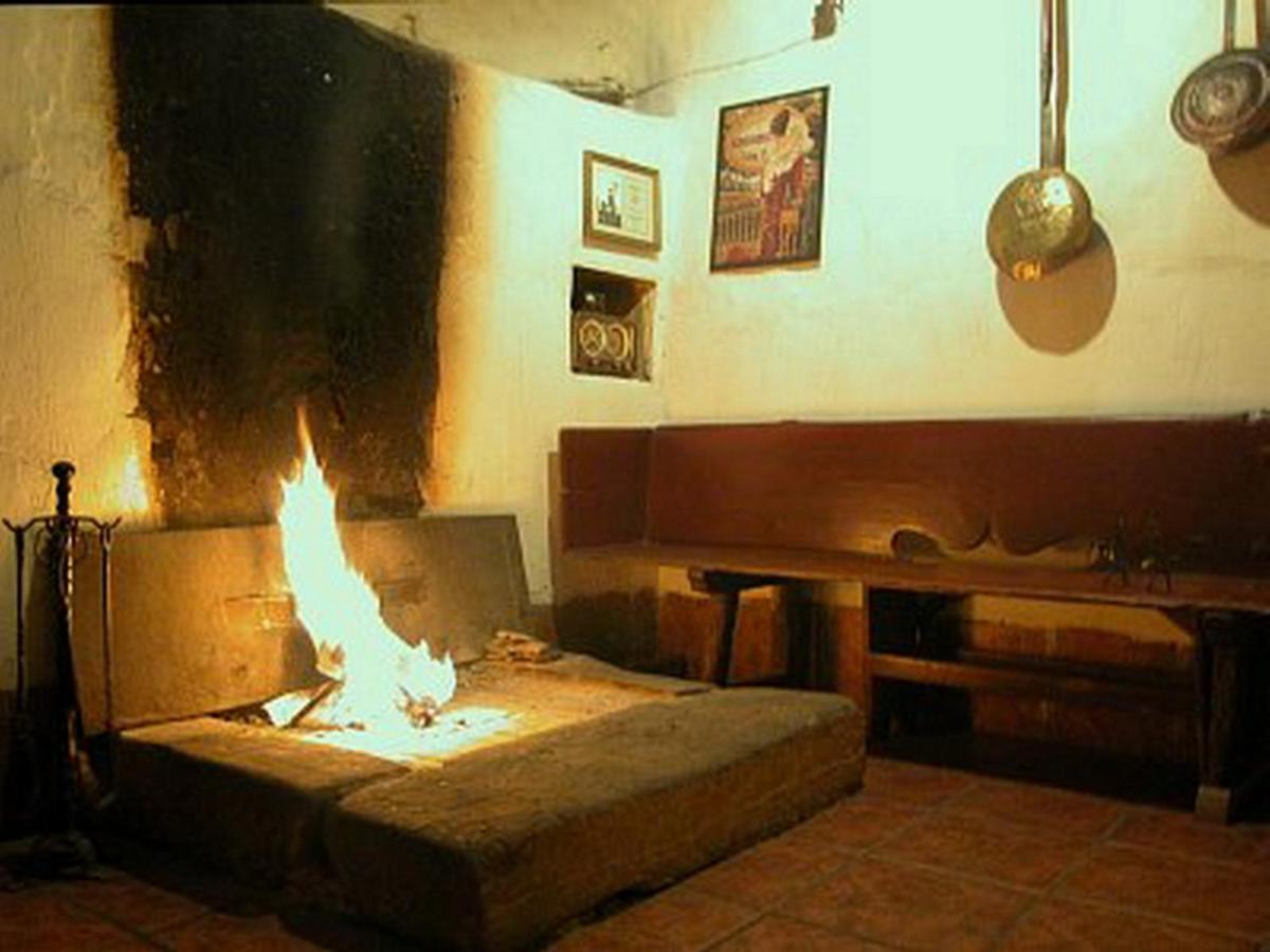 Zona de estar de Posada Real La Vieja Chimenea-Spa