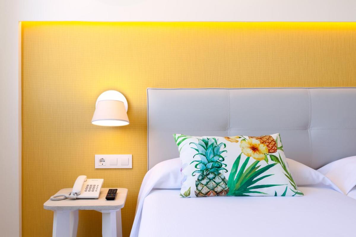 Cama o camas de una habitación en Hotel Tropical Park