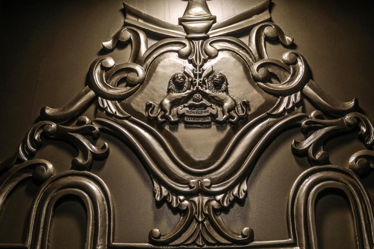 a metal picture frame with a skull on it at Shahpura House in Jaipur