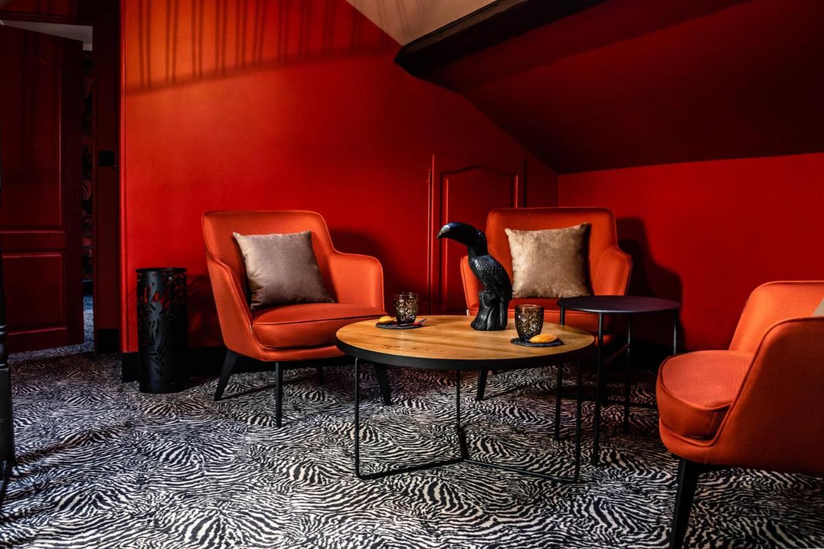 Coin salon dans l'établissement La villa 10 HÔTEL SPA