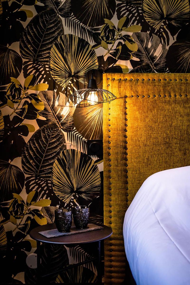 Un ou plusieurs lits dans un hébergement de l'établissement La villa 10 HÔTEL SPA