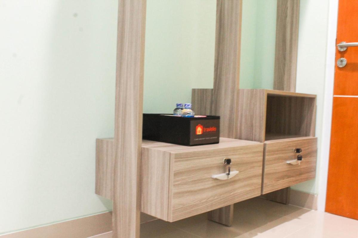 Simple Studio Room at Guest House Way Seputih near Central Park By Travelio - Hizvo