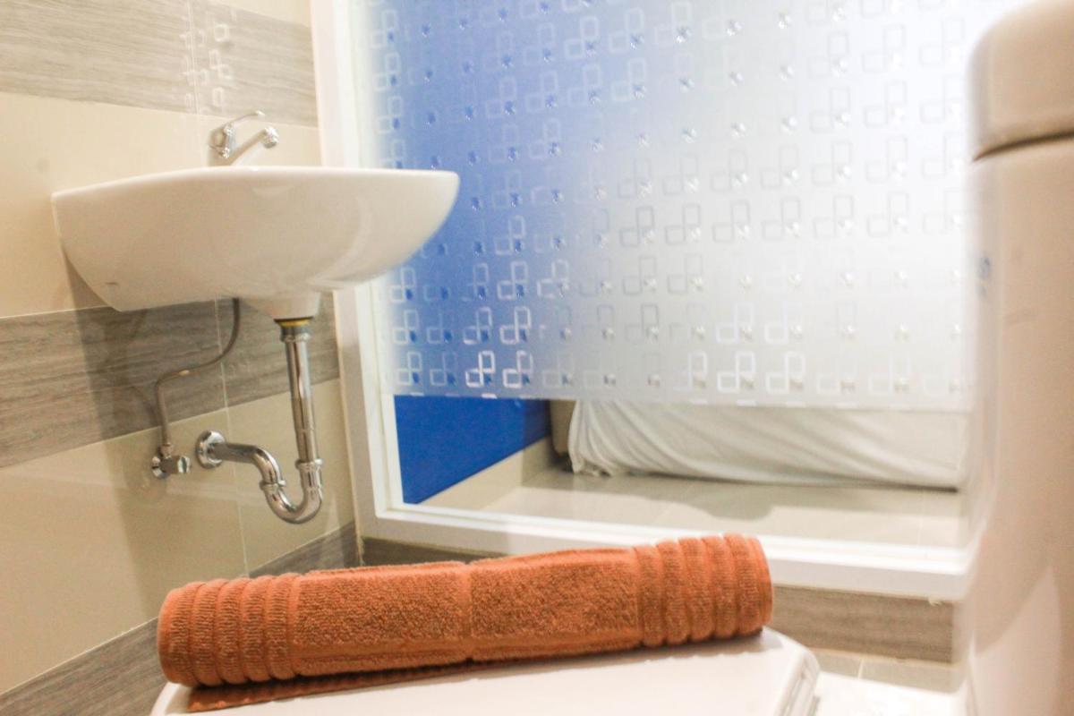 Simple Studio Room at Guest House Way Seputih near Central Park By Travelio - Hizvo