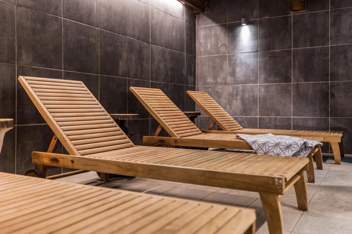 Photo de la galerie de l'établissement Résidence Pierre & Vacances Premium Les Hauts Bois, à Aime La Plagne