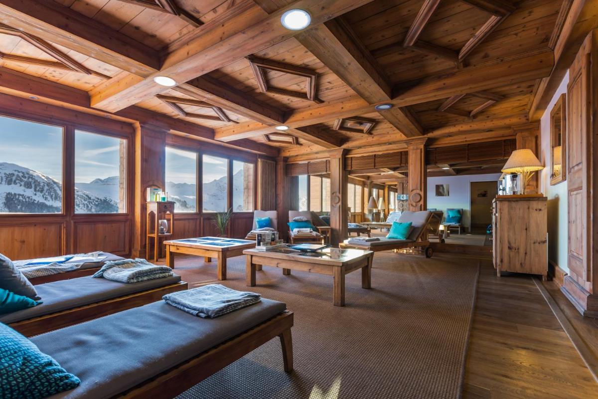 Coin salon dans l'établissement Résidence Pierre & Vacances Premium Les Hauts Bois