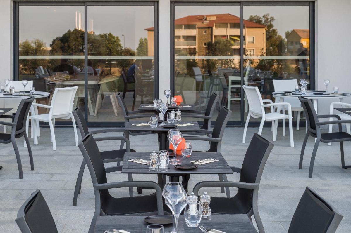 Restaurant ou autre lieu de restauration dans l'établissement Mercure Hotel & Spa Bastia Biguglia