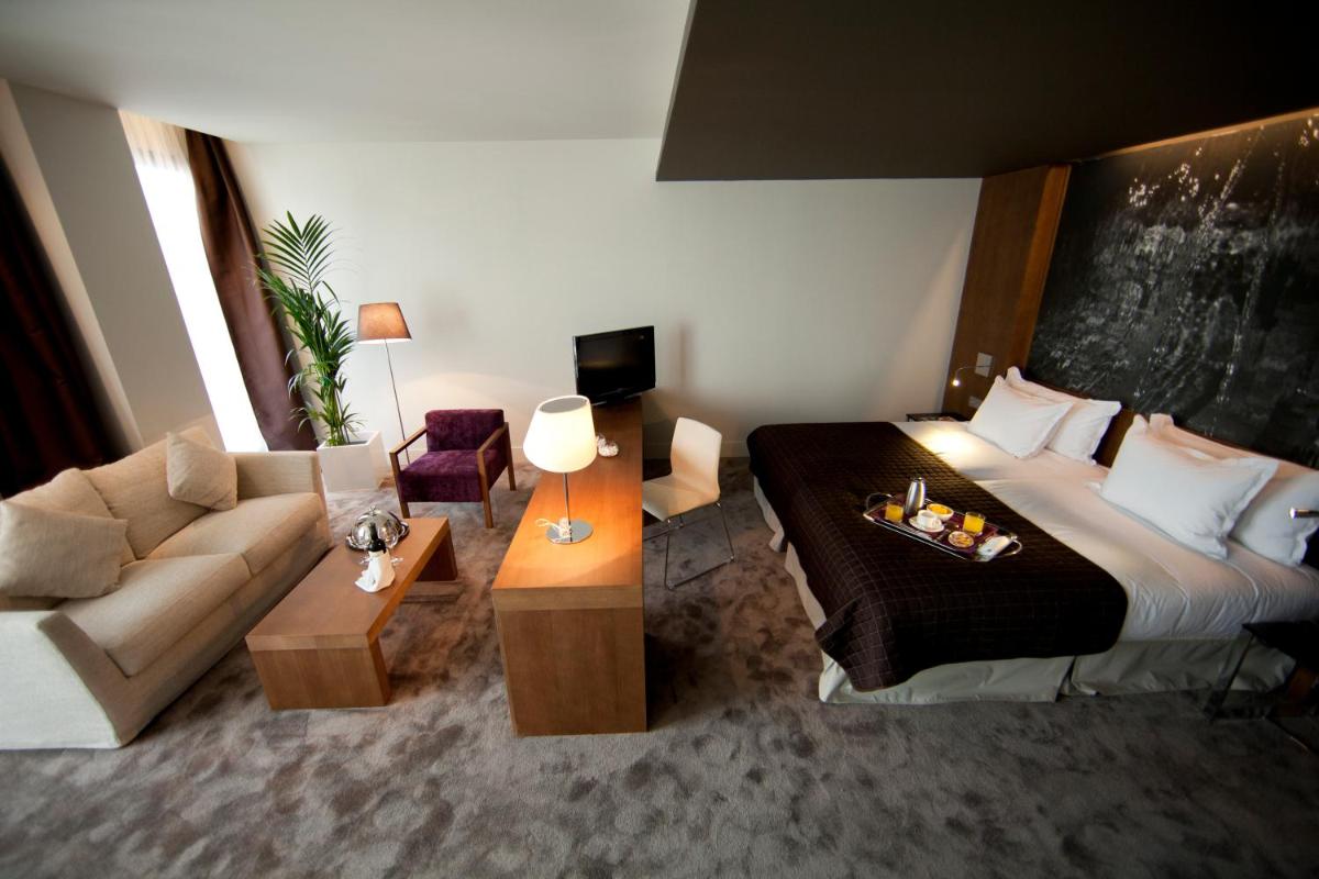 Cama o camas de una habitación en Blau Hotel Las Caldas