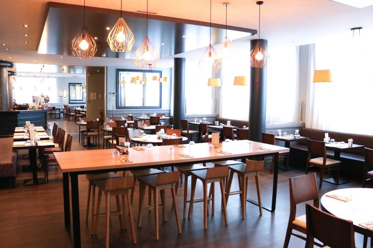 Restaurant ou autre lieu de restauration dans l'établissement Best Western Plus Hôtel & Spa de Chassieu