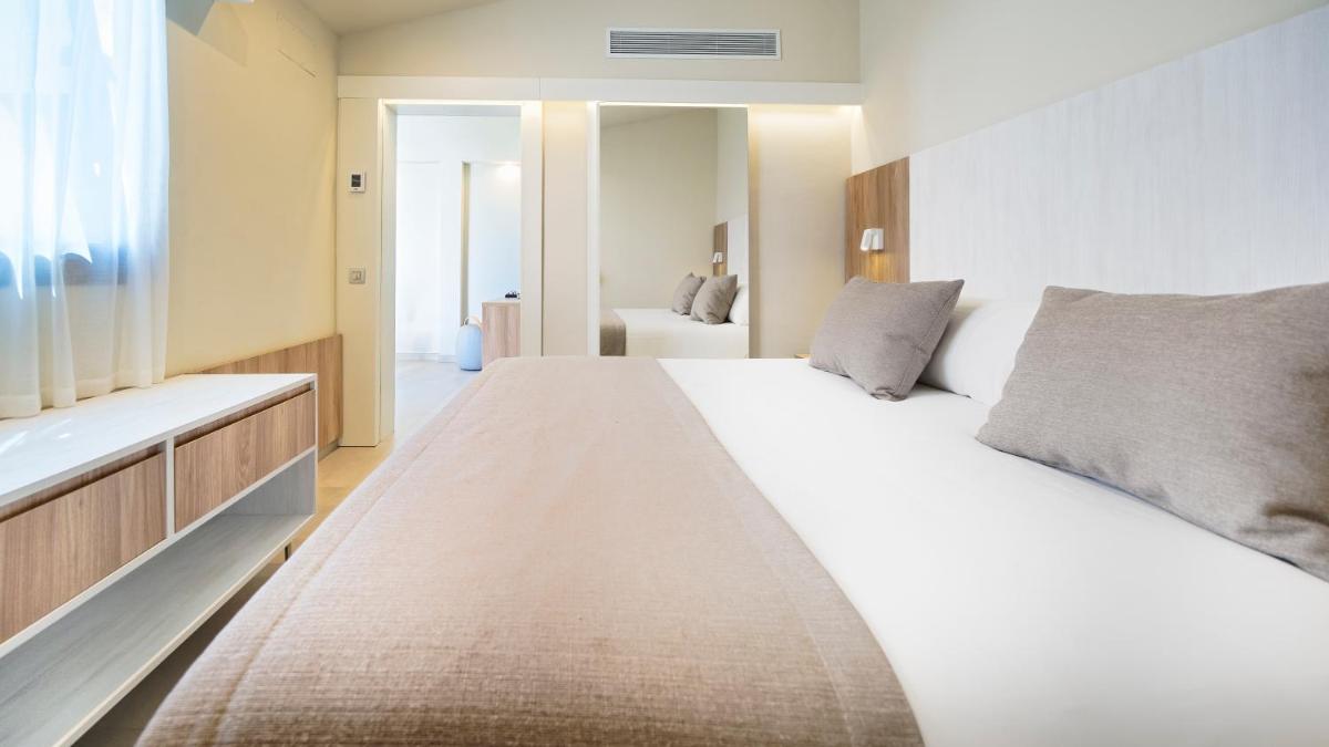 Cama o camas de una habitación en Club Maspalomas Suites & Spa - Adults Only