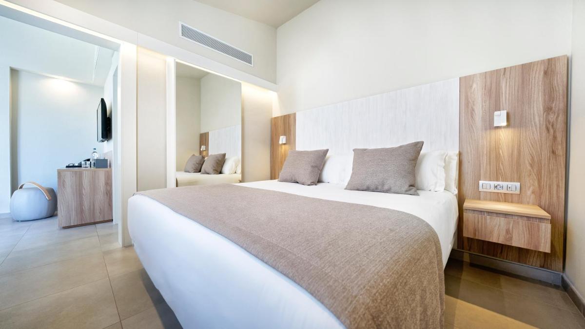 Cama o camas de una habitación en Club Maspalomas Suites & Spa - Adults Only