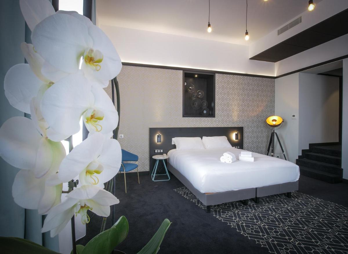 Le Magic Hôtel & Spa - Centre Historique - Accès TGV - Parking - Séminaires - Housity