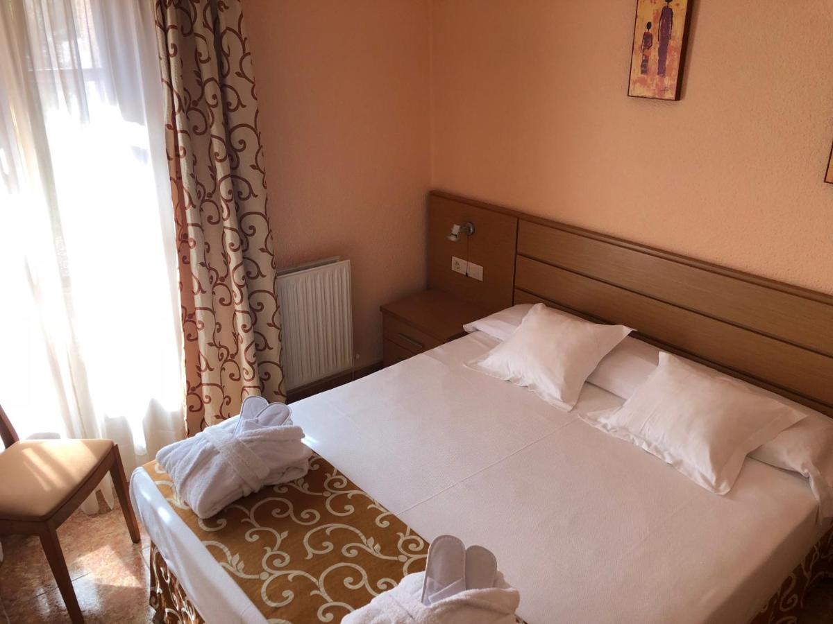 Cama o camas de una habitación en Hotel Balneario de La Virgen