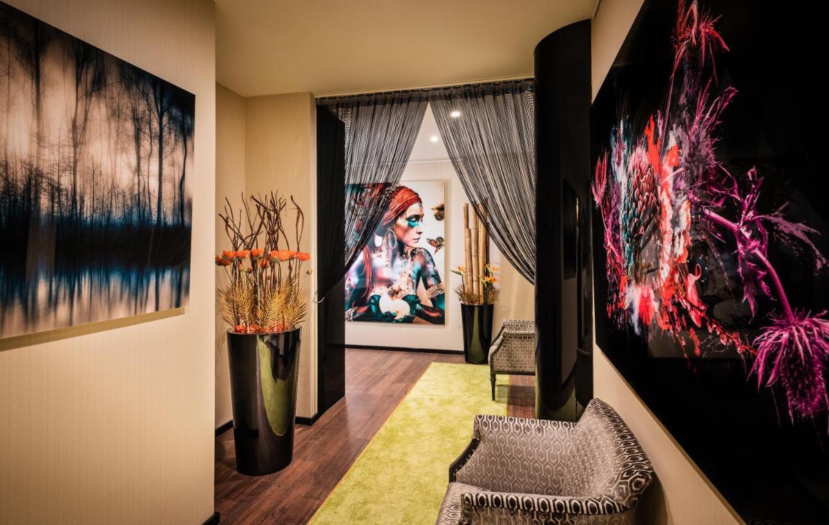 Ein Bett oder Betten in einem Zimmer der Unterkunft Breidenbacher Hof, Best Grandhotel 2025 - Die 101 Besten