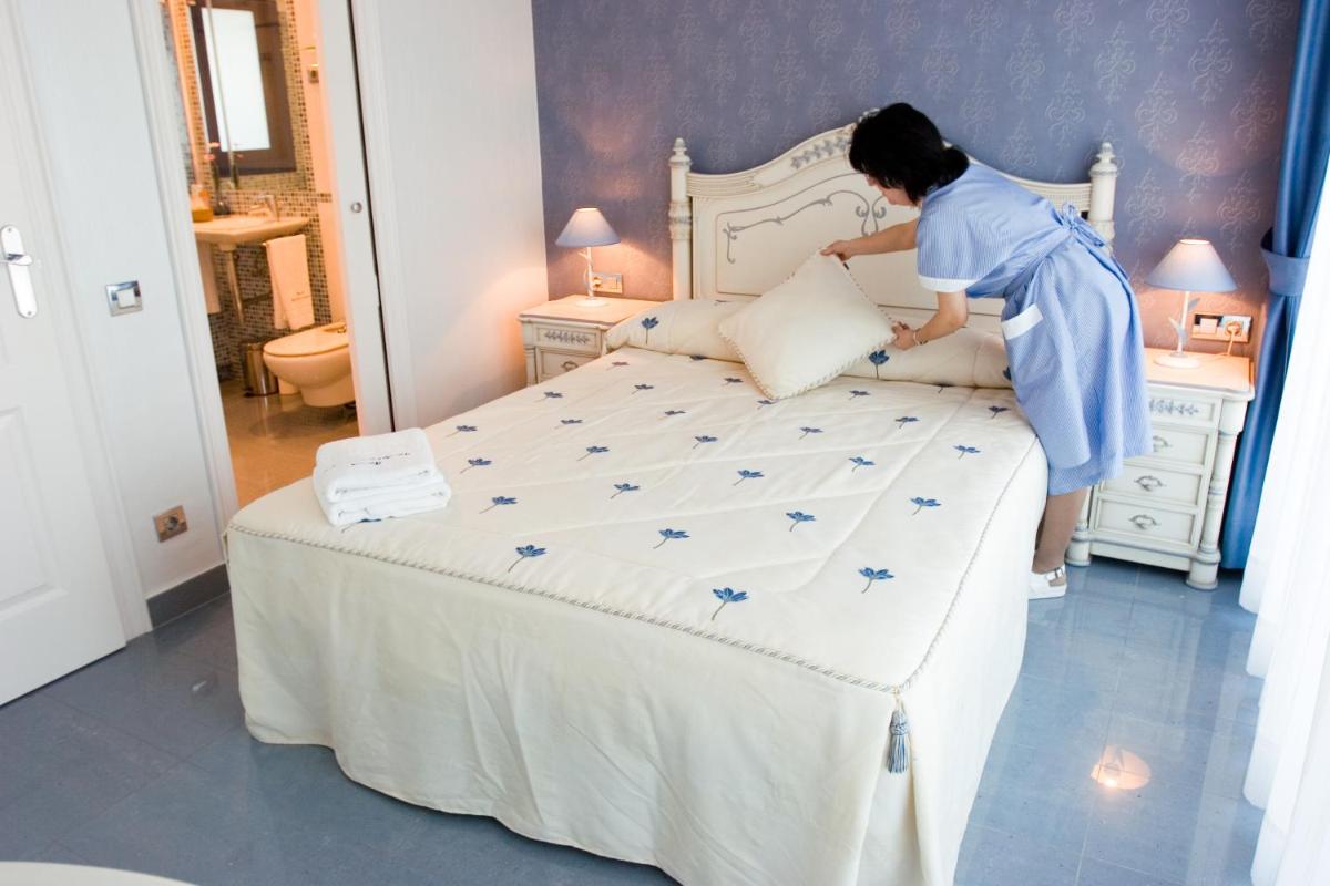 Cama o camas de una habitación en Masd Mediterraneo Hotel Apartamentos Spa