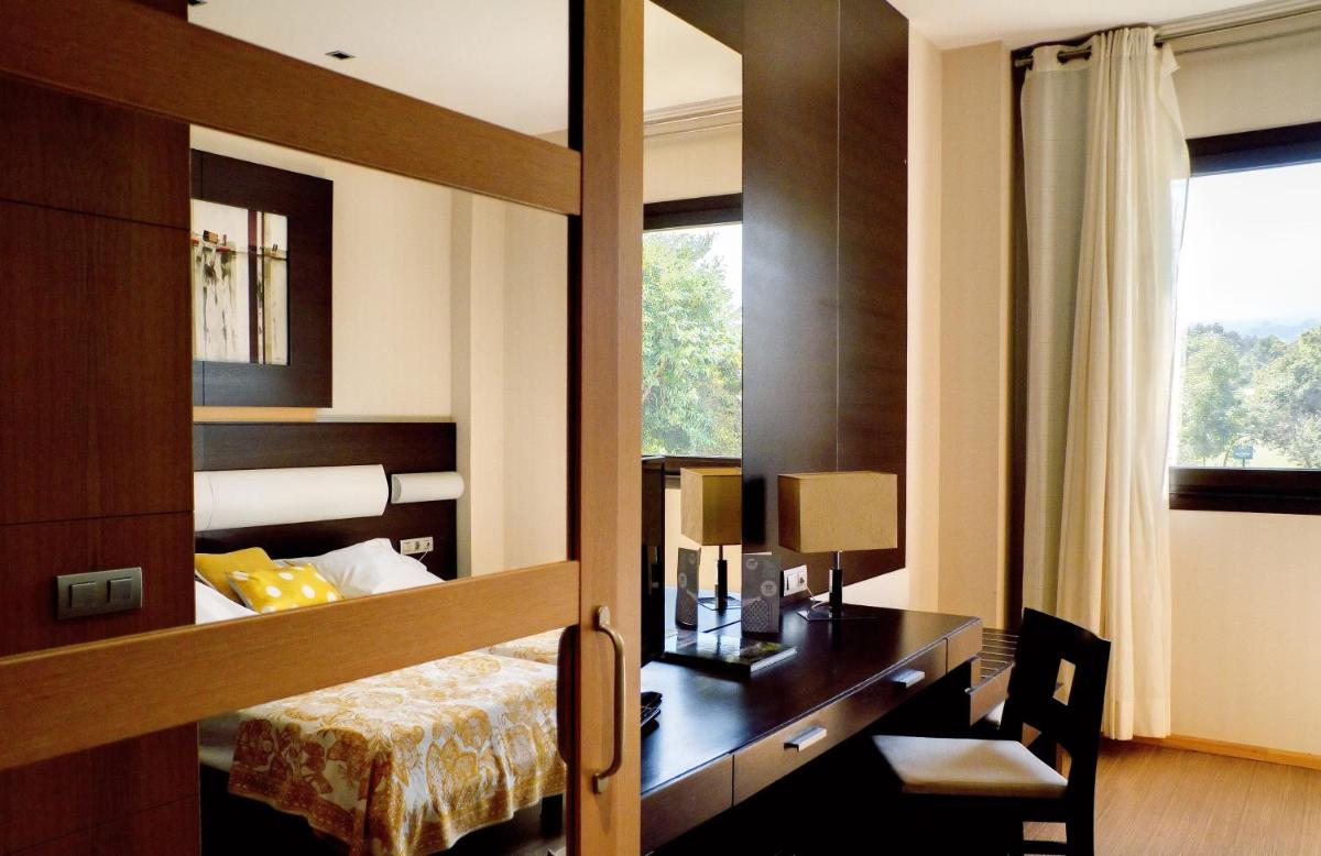 Cama o camas de una habitación en Oca Palacio De La Llorea Hotel & Spa