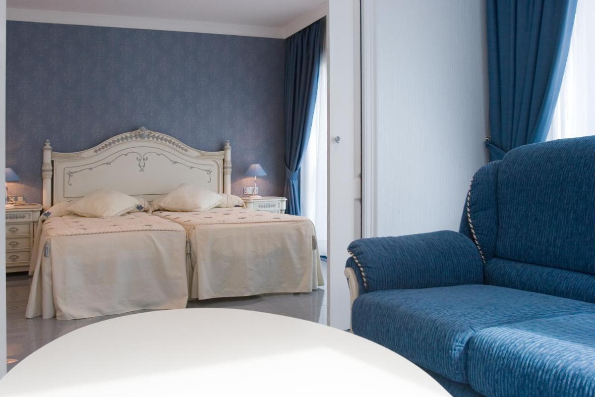 Cama o camas de una habitación en Masd Mediterraneo Hotel Apartamentos Spa