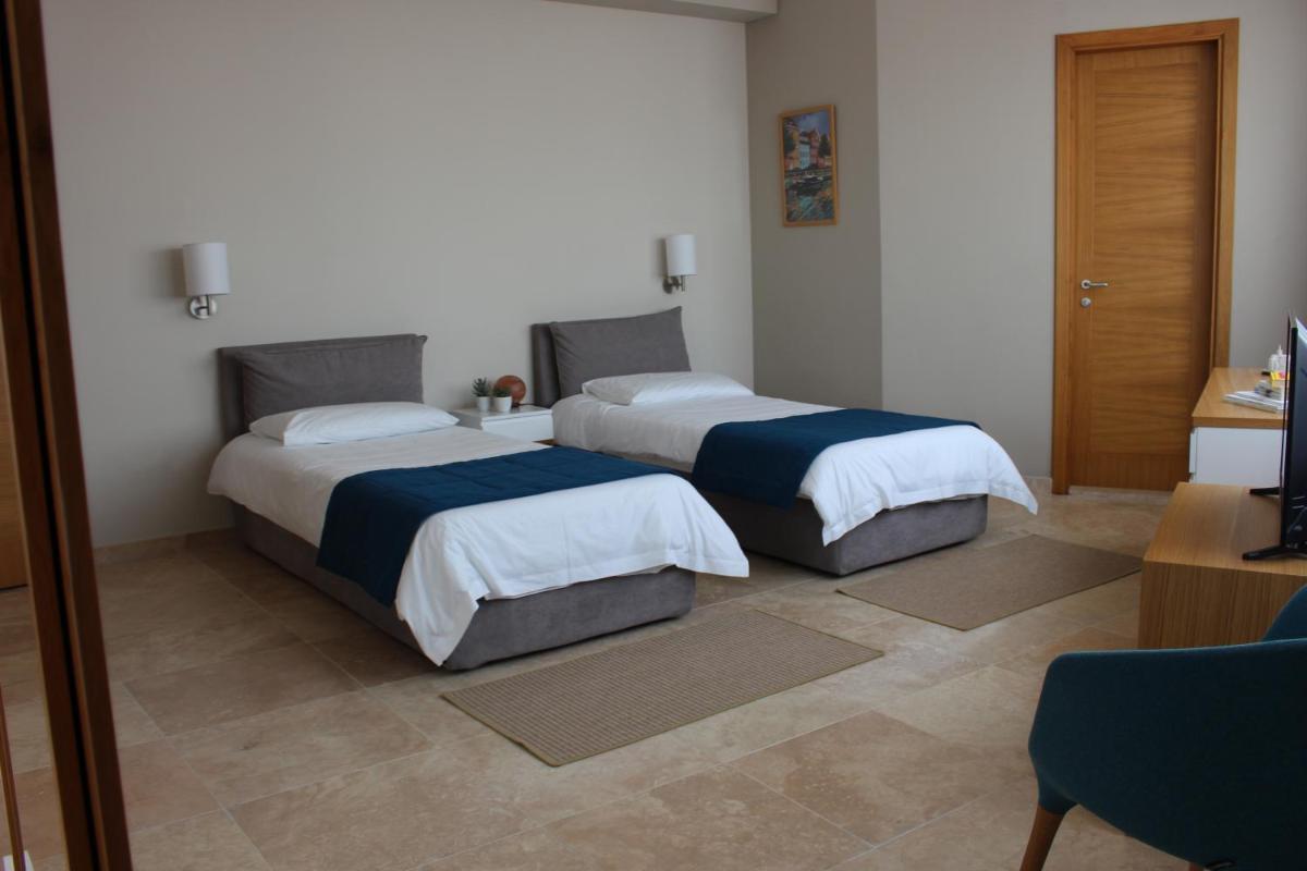 Grey Pearls Suites - Housity