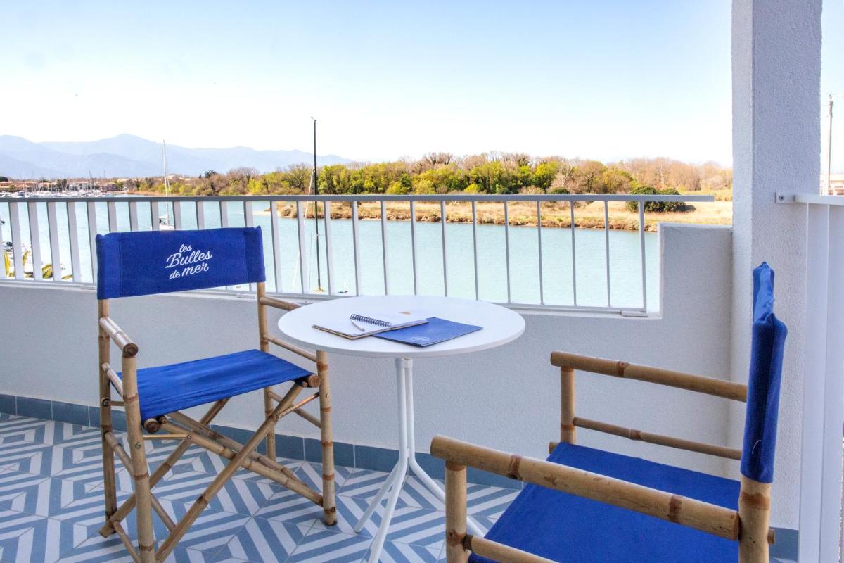 Balcon ou terrasse dans l'établissement Les Bulles de Mer - Hotel & Spa sur la Plage