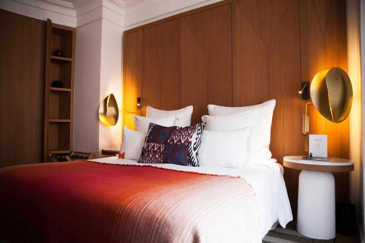 Un ou plusieurs lits dans un hébergement de l'établissement Hôtel Vernet Champs Elysées Paris Un ou plusieurs lits dans un hébergement de l'établissement Hôtel Vernet Champs Elysées Paris