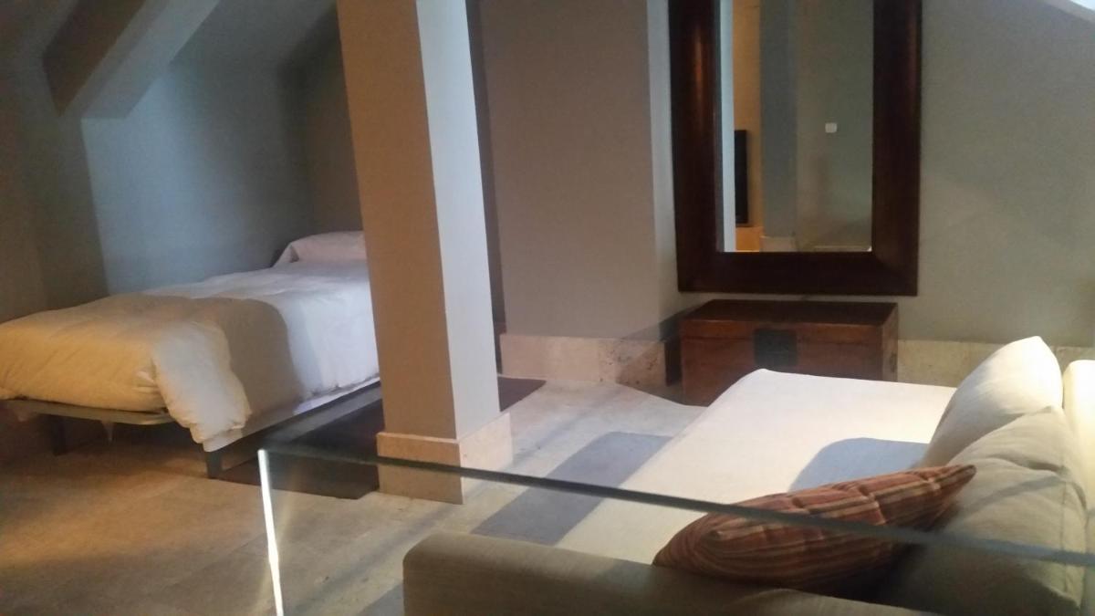 Cama o camas de una habitación en Hotel Palacio de Mengibar