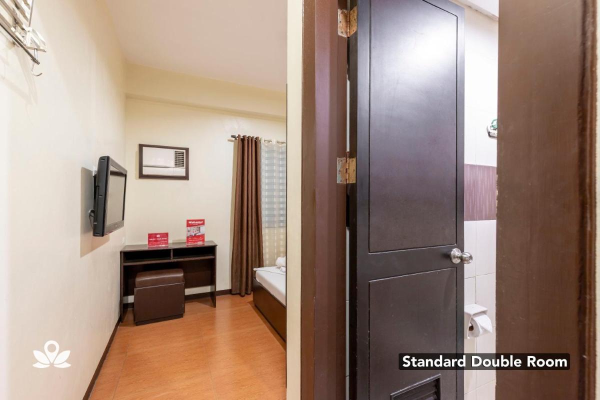 Orchard Hotel Davao - Housity