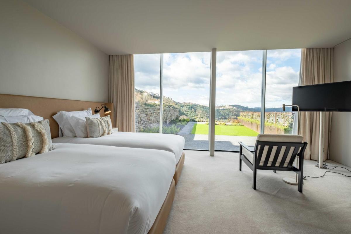 Uma cama ou camas num quarto em Octant Douro