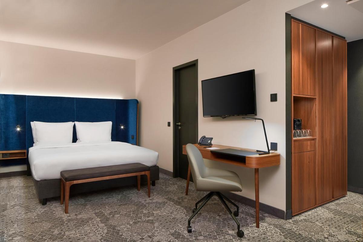 TV/Unterhaltungsangebot in der Unterkunft HYPERION Hotel München TV/Unterhaltungsangebot in der Unterkunft HYPERION Hotel München