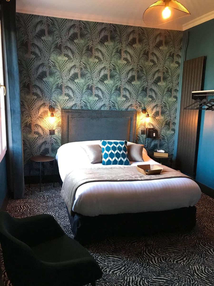 Un ou plusieurs lits dans un hébergement de l'établissement La villa 10 HÔTEL SPA