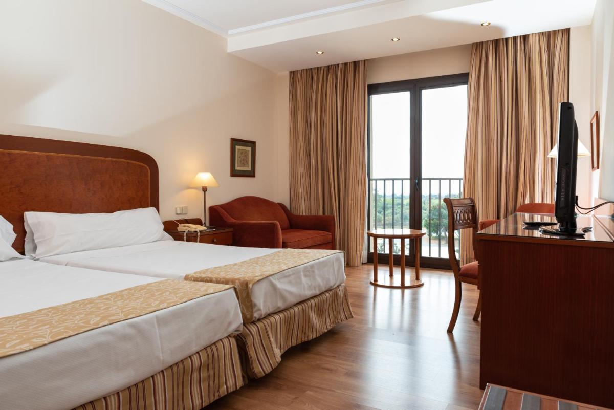 Cama o camas de una habitación en Termes Montbrio Hotel & Spa