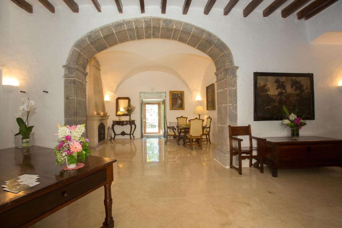 Zona de estar de L’Hermitage Hotel & Spa