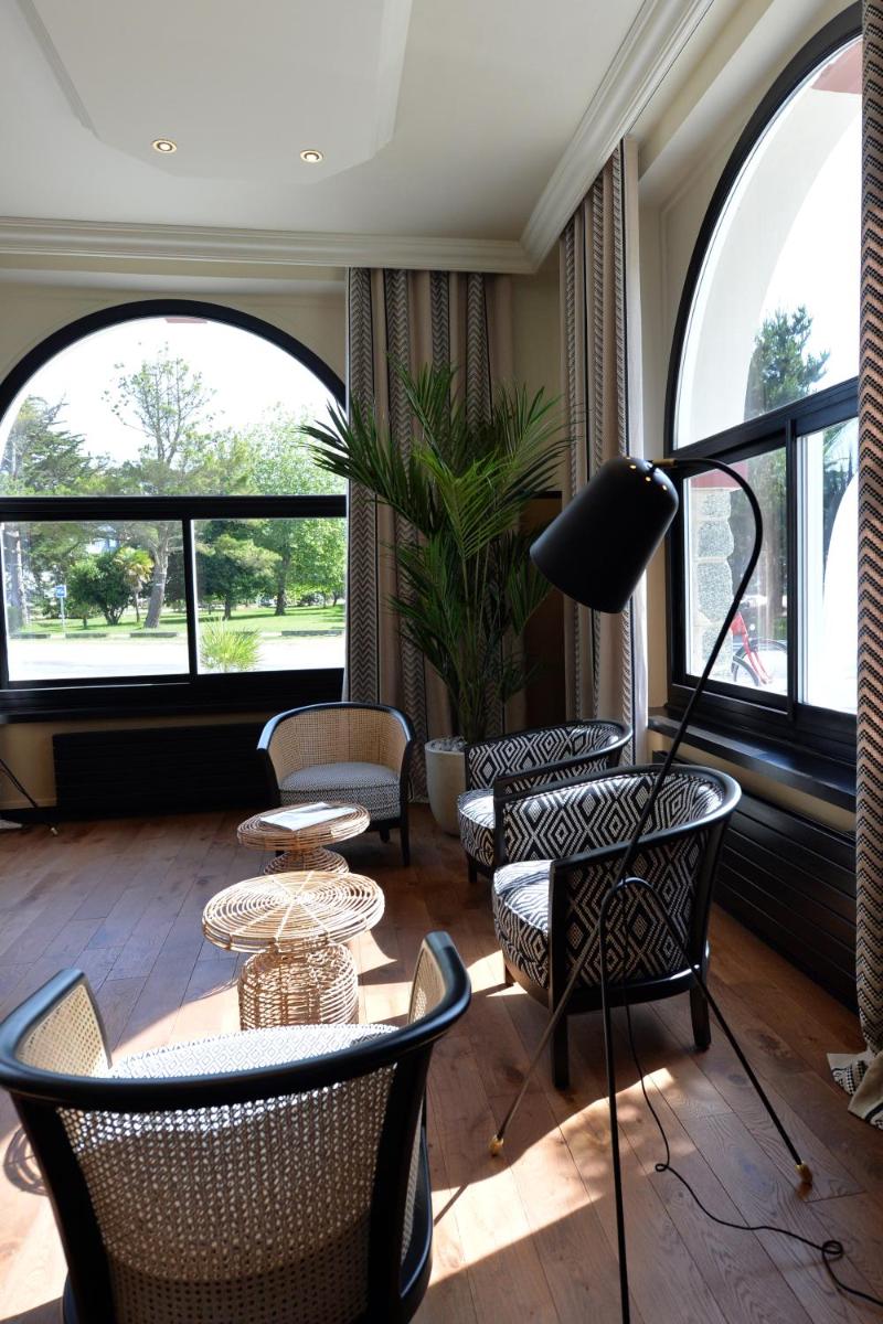 Coin salon dans l'établissement Hotel De Diane