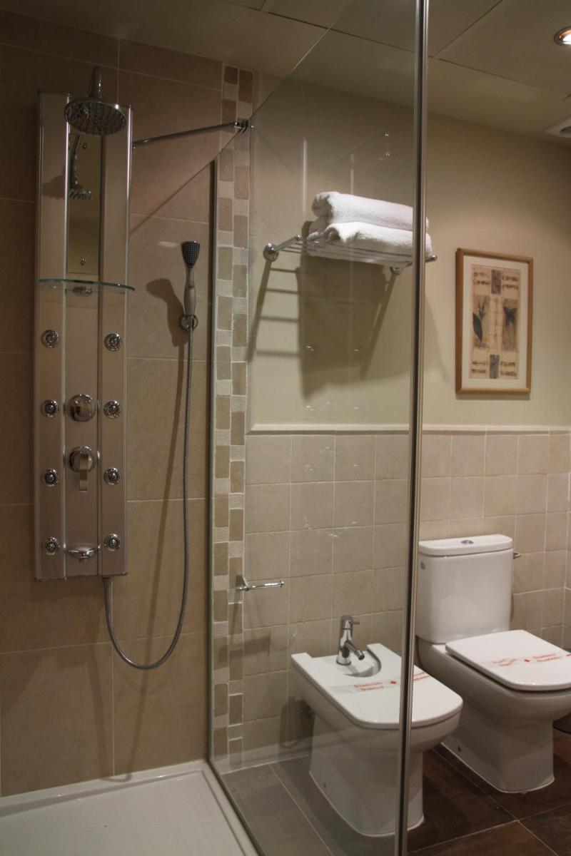 Un baño de Cal Barber