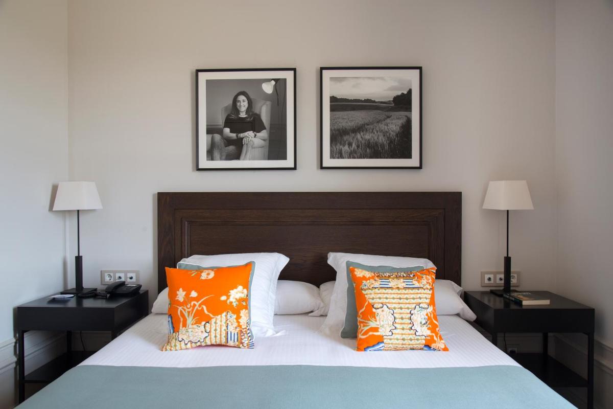 Cama o camas de una habitación en Casa Anamaria Hotel