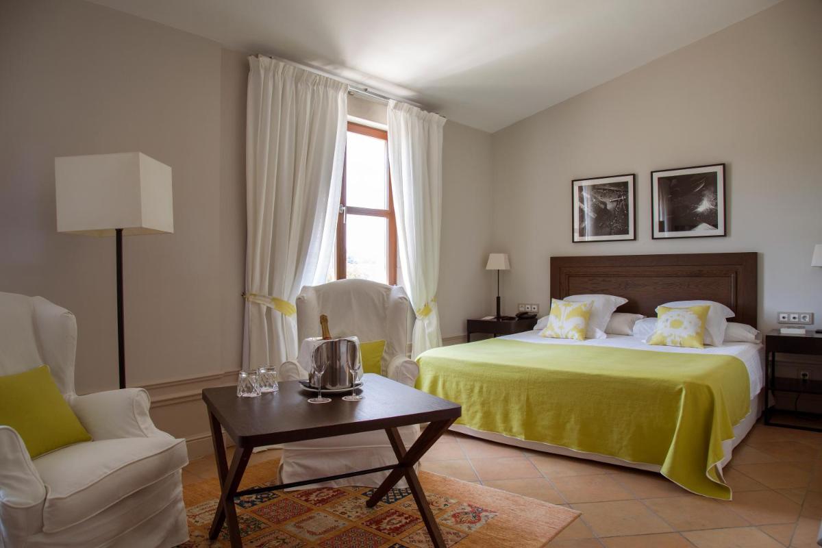 Cama o camas de una habitación en Casa Anamaria Hotel