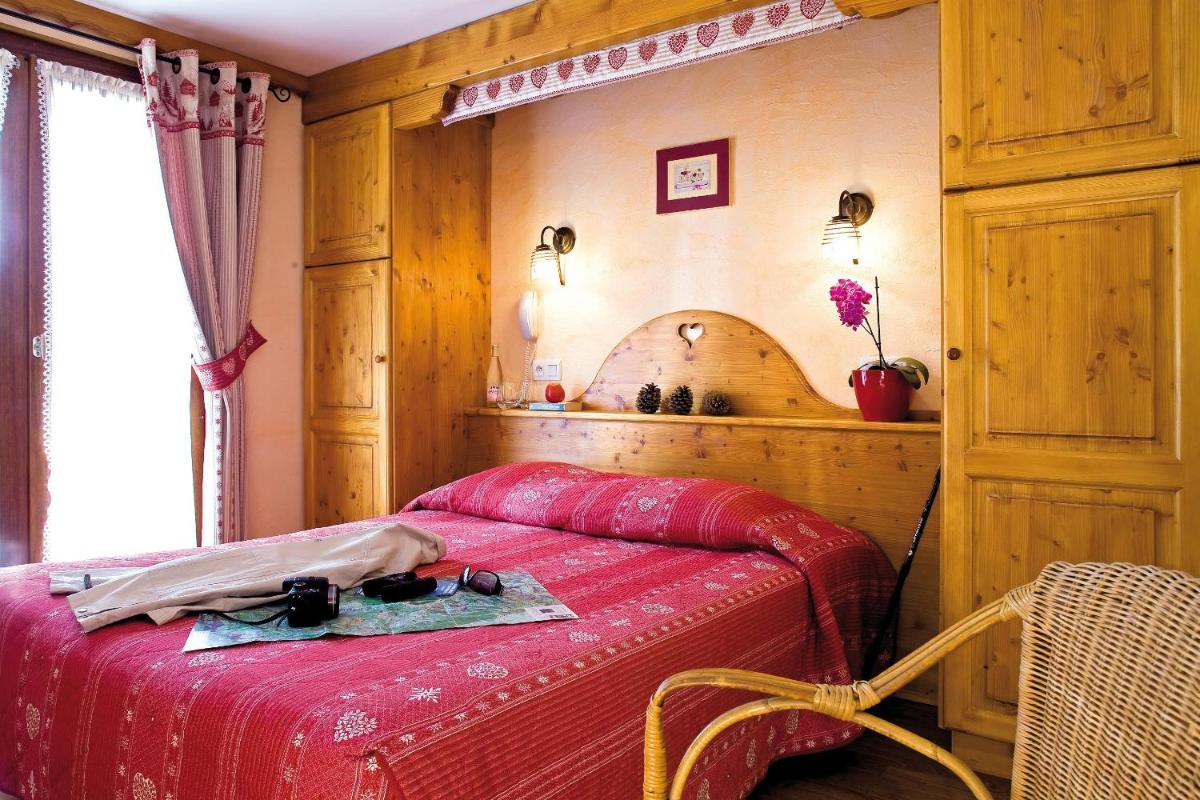 Un ou plusieurs lits dans un hébergement de l'établissement Hôtel Belalp