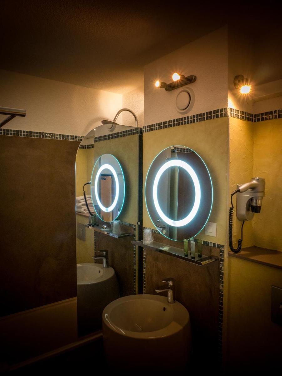 Salle de bains dans l'établissement Le Belvedere