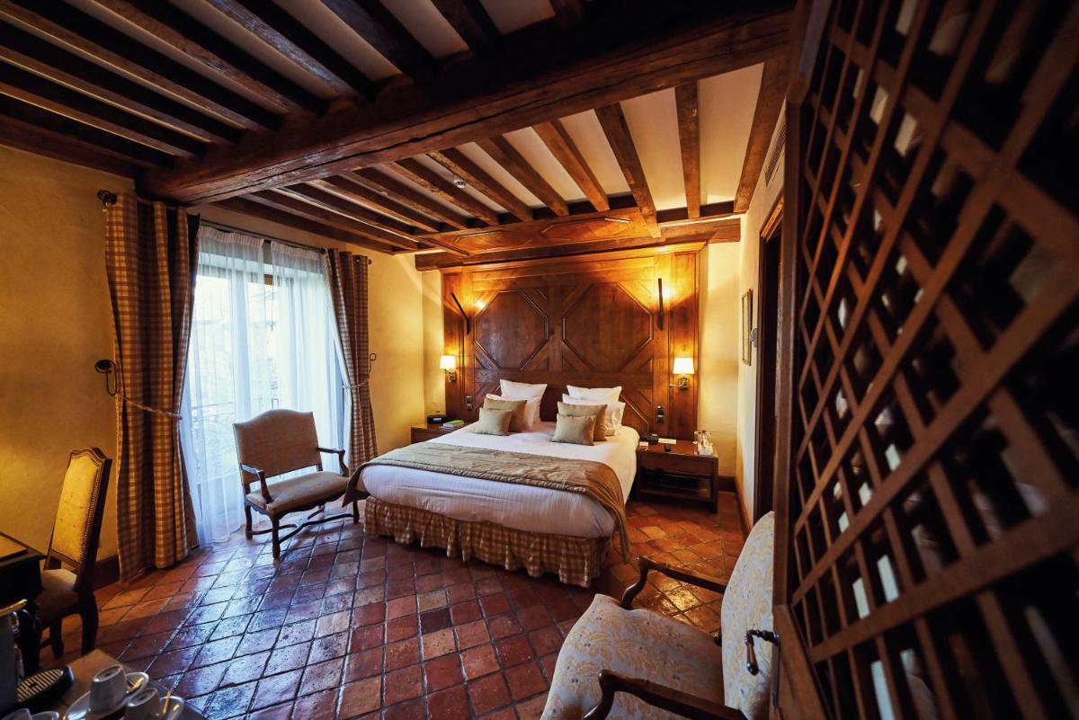 Un ou plusieurs lits dans un hébergement de l'établissement Relais Bernard Loiseau