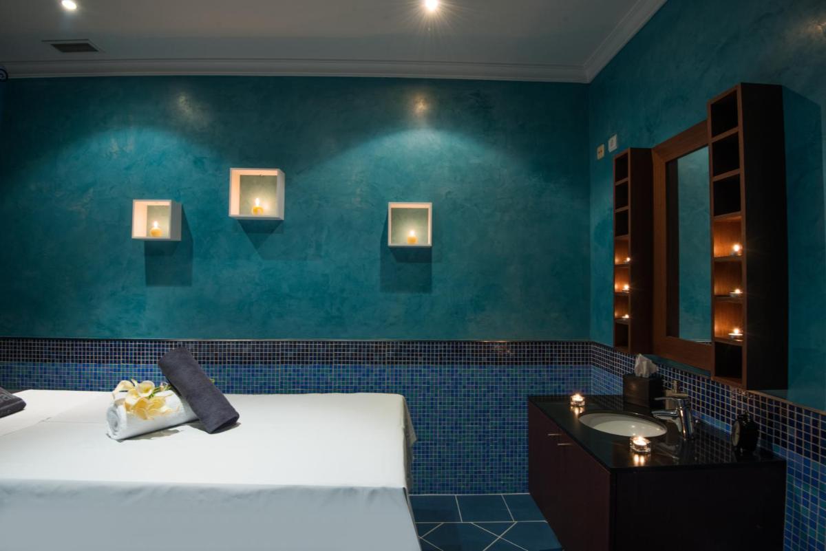 Uma cama ou camas num quarto em Vila Gale Tavira