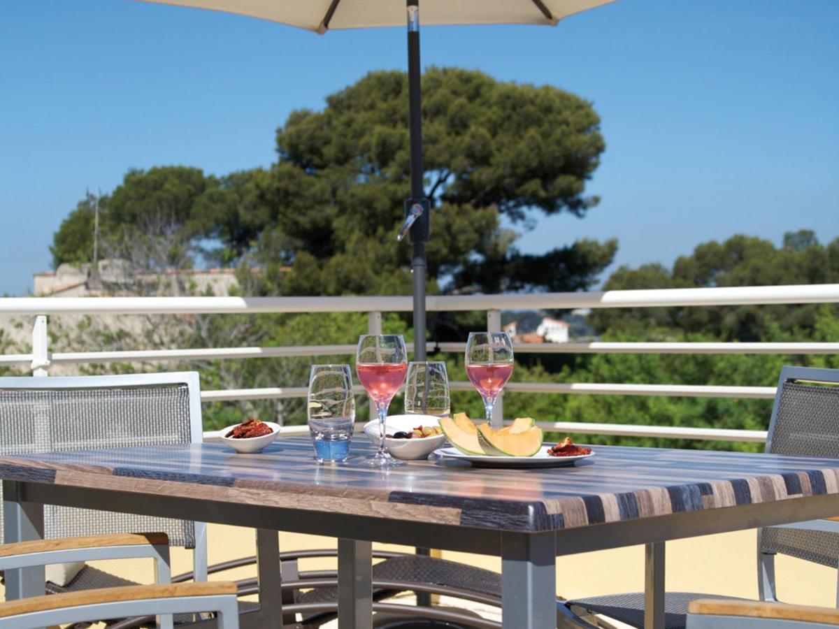 Balcon ou terrasse dans l'établissement Lagrange Vacances Les Terrasses des Embiez