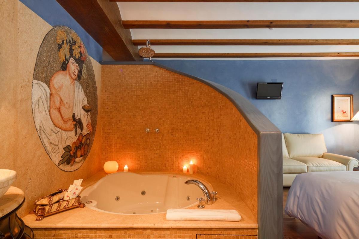 Cama o camas de una habitación en Hospederia de los Parajes