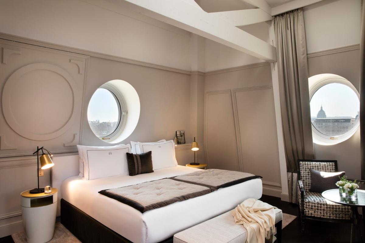 Un ou plusieurs lits dans un hébergement de l'établissement Le Damantin Hôtel & Spa