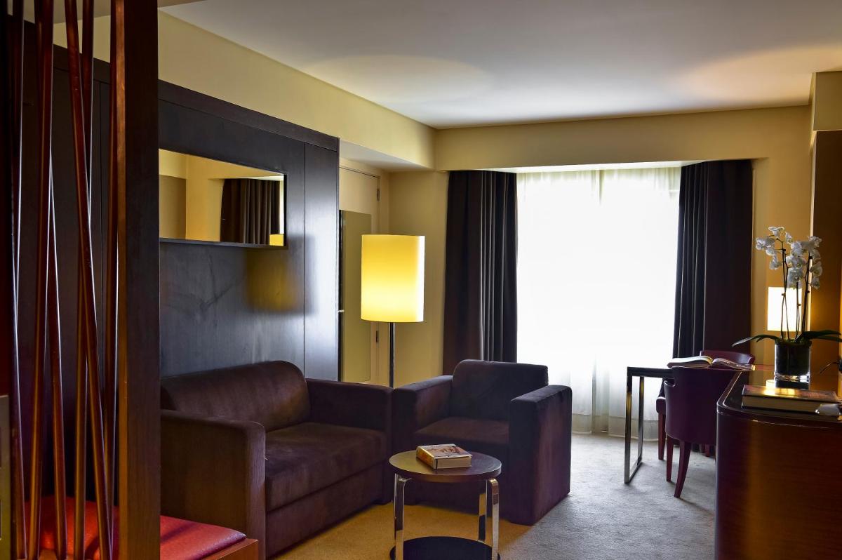 Uma área de estar em Porto Palácio Hotel by The Editory