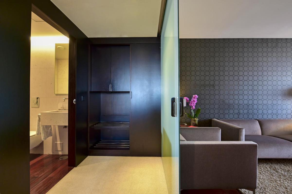 Uma área de estar em Porto Palácio Hotel by The Editory