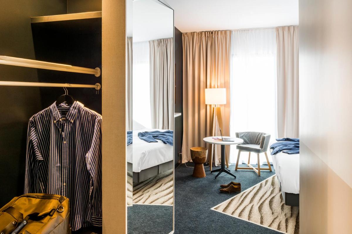 Un ou plusieurs lits dans un hébergement de l'établissement Mercure Hotel & Spa Bastia Biguglia