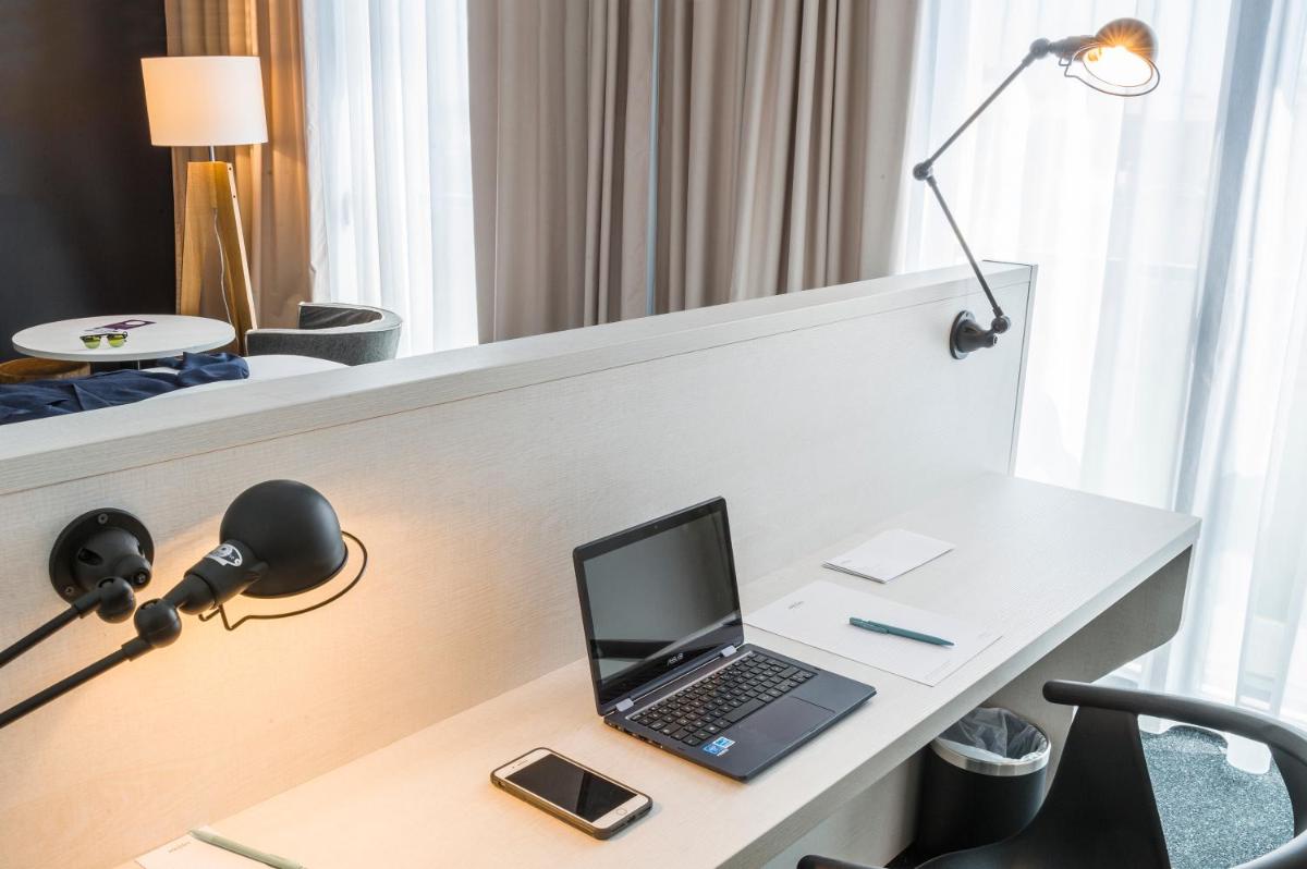Télévision ou salle de divertissement dans l'établissement Mercure Hotel & Spa Bastia Biguglia