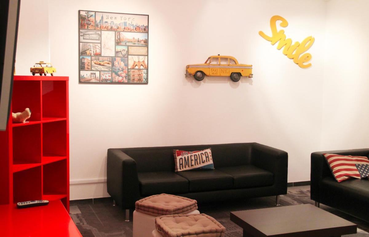 Coin salon dans l'établissement Résidence Club mmv Le Hameau des Airelles ****