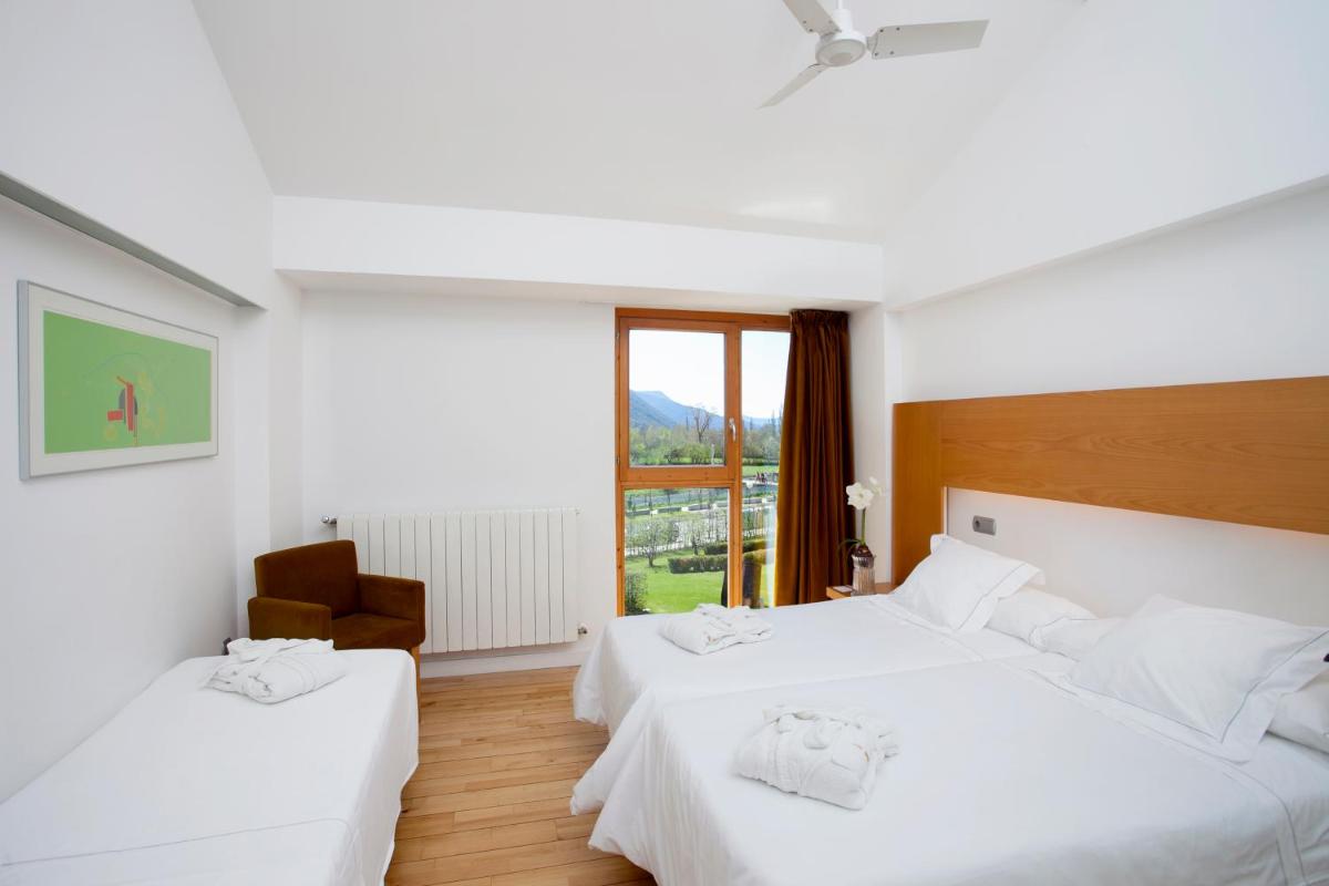Cama o camas de una habitación en Tierra de Biescas