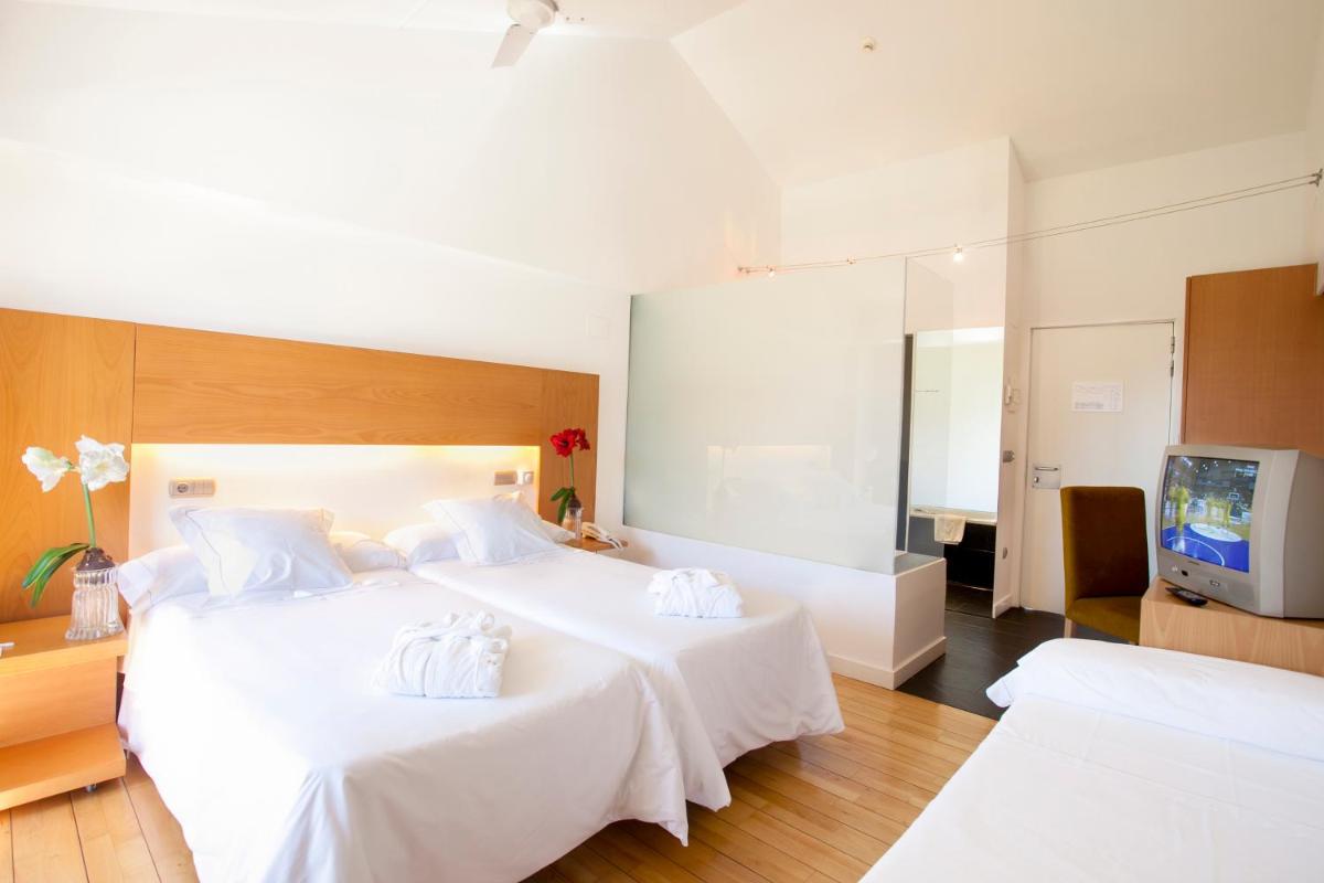 Cama o camas de una habitación en Tierra de Biescas
